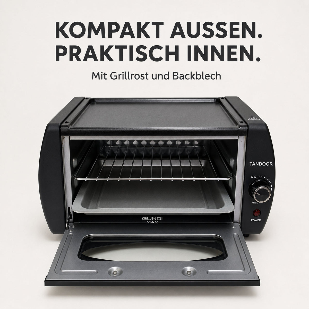 Geöffneter Gundi Max Tandoor mit Grillrost und Backblech